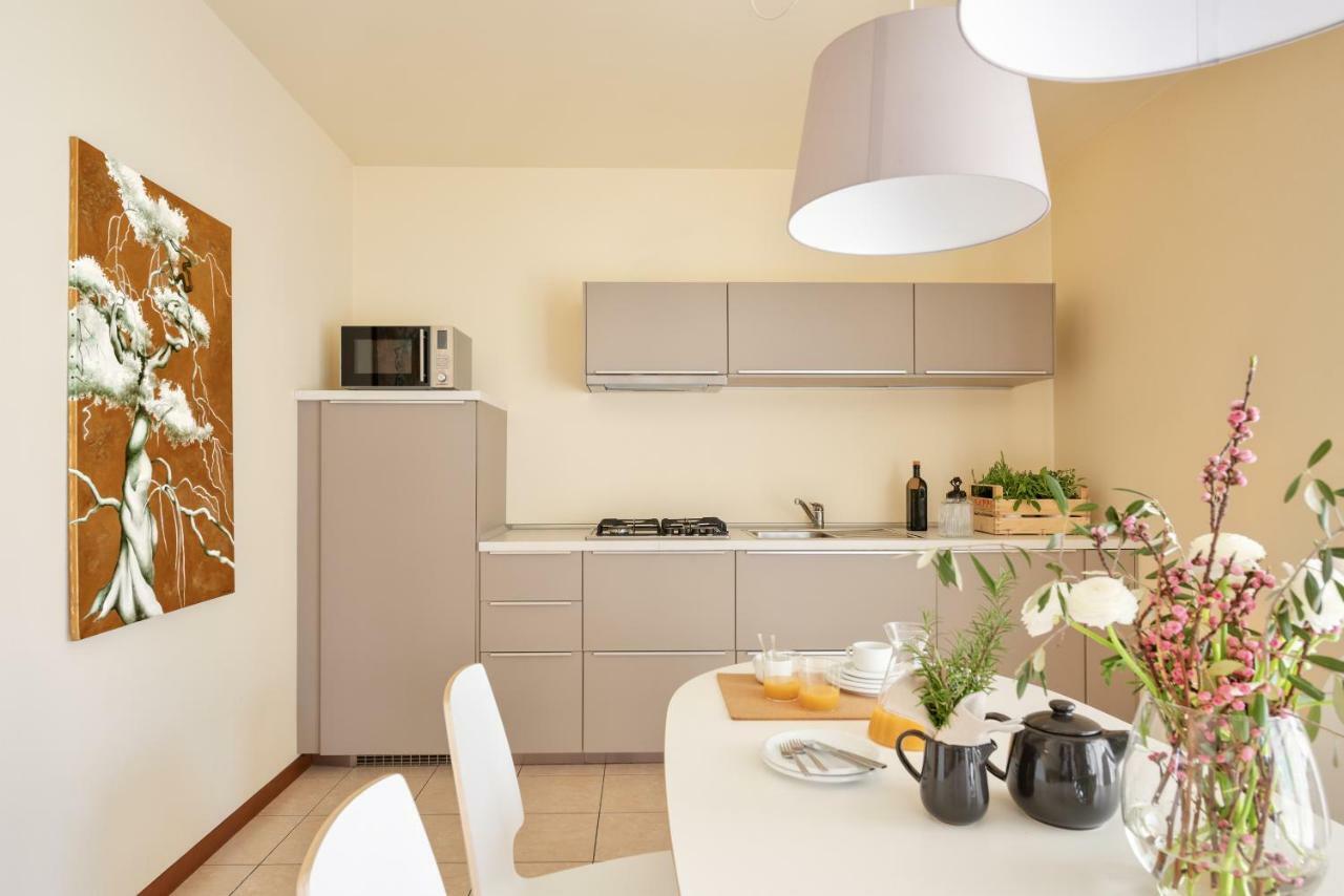 Appartamenti Corte Dei Cipressi Roe Bagian luar foto